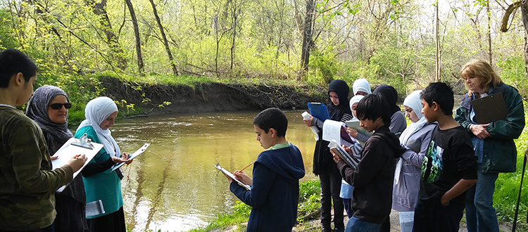 SM Crescent 13 - children and chaperones learn at the river