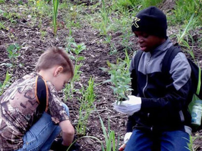 Kids planting for the sake of the Rouge River's restoration