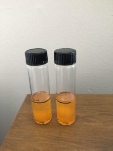 Test tubes with yellow liquid