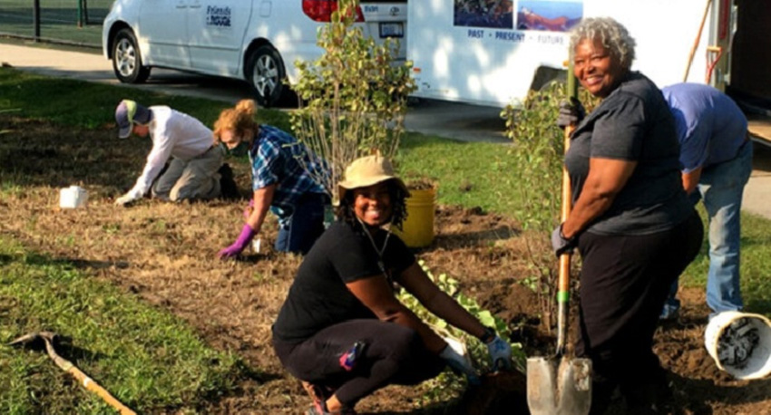 2022 Volunteer Restoration Opportunities with volunteers planting trees
